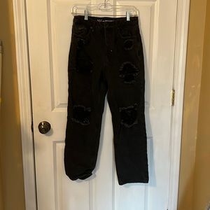 High-waisted distressed jeans.